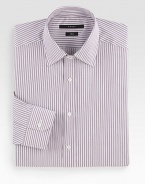 A refined dress style in fine cotton with narrow purple stripes. Buttonfront Moderate spread collar Cotton Dry clean Made in Italy 