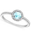 Color as clear as the ocean. This gorgeous CRISLU ring flaunts a faceted, aquamarine-colored cubic zirconia at the center, surrounded by smaller clear cubic zirconia (5/8 ct. t.w.). Set in platinum over sterling silver. Nickel-free for sensitive skin. Size 6, 7, and 8.