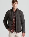 A modish jacket in quilted nylon gvies you the edge in both fashion and comfort. From Vince.