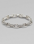 Defined anchor links handsomely crafted in fine sterling silver.Sterling SilverAbout 9Lobster claspImported