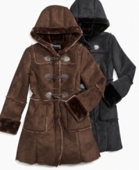 Faux-fur trim and shearling look on these chic coats from S. Rothschild give her a finely tuned winter style.