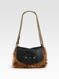 Indulge in this petite fox fur and leather style that is crafted to perfection.Detachable convertible chain shoulder strap, 11-20 dropTurnlock flap closure8W X 6H X 1½DImported