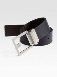 An essential, reversible design fit for any look with a brushed silvertone buckle. About 1¼ wide Imported