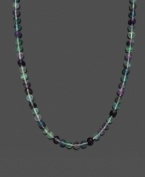 A fresh mix of spring color. Necklace features green and purple fluorite beads (8-9 mm) with a 14k gold clasp. Approximate length: 18 inches.