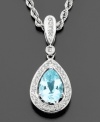 Elegant and refined, this aquamarine (1-1/2 ct. t.w.) drop necklace features a flurry of sparkling diamonds (1/4 ct. t.w.) cast in 14k white gold. Chain measures 18.