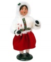 Flushed from the cold but filled with warmth, this young caroler is ready for the North Pole's biggest event of the year in a fluffy snow-white coat. A beauty from Byers' Choice.