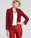 A chicly-cropped Alice + Olivia blazer marches into fall in this iconic color duo and a fresh geometric print.