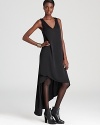 A modern take on the LBD, this BCBGMAXAZRIA dress is simple and chic, accented with a floor-grazing high/low hem.