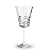 Horizontal, leaf-like cuts dance across the bowls of this captivating stemware collection from Baccarat.