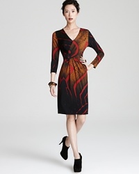 Exude animal magnetism in a whimsical, tiger-print Escada dress, rendered in versatile jersey for sleek, go-to style.