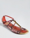 Fiery snakeskin embossed leather shines on DV Dolce Vita's structural Archer sandals.