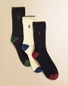 Three-pack of ribbed dress socks with contrast color tipping at cuff, pony, heel and toe. Each 3-pack includes black with green, white with blue, navy with red.Dress-style to wear with slacks85% cotton,14% polyester/1% spandexMachine washImported