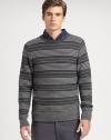 A new classic, a merino-wool knit sweater with a brilliant pattern.CrewneckPull-on styleMerino woolDry cleanImported