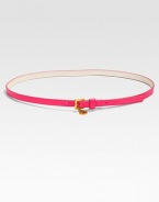 How charming, this skinny belt offers a pop of on-trend, neon color and a unique, charmed buckle closure.About .5 widePVCCharm on buckle closureImported