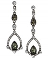 Glistening touches add glamour to these earrings from Givenchy. Crafted from hematite-tone mixed metal, the pair features clear and dark green glass crystal stones for a stunning effect. Approximate drop: 6-1/5 inches.