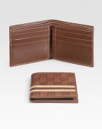 Signature guccissima leather with six card slots and two bill compartments. Fabric web detail 3¾ X 4¼ Made in Italy 