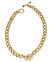 Make a name for yourself with this ID necklace from Juicy Couture. Crafted from gold tone brass, zinc and stainless steel, the toggle necklace features glass accents and cubic zirconia (1/2 ct. t.w.) for a hip effect. Approximate length: 14 inches. Approximate drop: 3/4 inch.