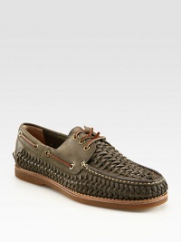 Exquisite woven detail defines the look and design of this classic boat shoe, constructed in fine leather.Leather upperLeather liningPadded insoleRubber soleImported