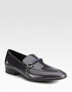 Slip-on classic crafted from shiny patent leather with woven detailing and signature ornament.Patent leather upperLeather liningPadded insoleLeather soleMade in Italy