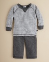 With a cozy waffleknit on one side and weighty fleece on the other, this cute sweatshirt and pant set offers instant comfort and cool, vintage-inspired style.