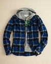 Diesel rock's the layered look, avoiding bulk with a plaid flannel shirt updated with a hooded henley inset.