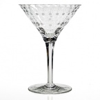 Made entirely from hand, each piece of William Yeoward Crystal draws its inspiration from antique crystal pieces originally made in England during the 18th and early 19th centuries. Here, a design from 1790 is still unbelievably contemporary with decorative matte and polished bubbles adorning a mod martini glass.