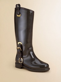 With the look of a classic riding boot, this all-rubber, weatherproof style is richly detailed with decorative buckles, stirrup-shaped hardware and pull-on tabs.Pull-on styling with tabsDecorative hardwareRubber upper and solePadded insoleImported