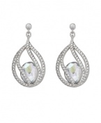 Polish your look with subtle refinement. Crystal Moonlight is encapsulated by intricate strands of clear Swarovski crystal pavé. This exquisite pair of silver tone mixed metal pierced earrings adds glamour to every look. Approximate drop: 1-3/8 inches.