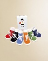 Six-pair gift set in an adorable tennis shoe design, perfect for the budding pro. Non-skid bottoms Boxed for giving Appropriate for ages 0-12 months Cotton; machine wash Imported