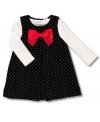 Decorated with an oversized bow is this 2 piece dot galore jumper and solid bodysuit by Carter's.