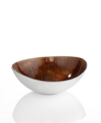 Full of surprises, this handcrafted bowl features sleek, polished aluminum lined with rich, earthy amber. Keep it on display no matter what's on your menu. From the Simply Designz serveware and serving dishes collection.