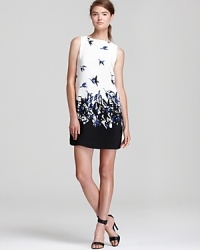 Exude city chic in a bird-print Tibi shift dress and soar to new style heights.