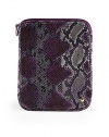 THE LOOKPython-printed fabricRectangular silhouetteTop zip closureSignature goldtone studs on the pull and frontSoftly padded interiorAccomodates the iPad skin for iPad and iPad 2THE MEASUREMENT8½W X 10½H X ½DTHE MATERIALFabricNylon liningORIGINImportedPlease note: iPad® not included. 