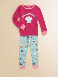 Her dreams will be sweet indeed with visions of cupcakes dancing in her head, inspired by the front appliqués and cupcake-print bottoms.Ribbed contrast crewneckLong sleeves with contrast ribbed cuffsElastic-waist bottoms with contrast ribbed cuffsCottonMachine washImported