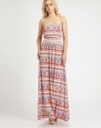 For a casual-cool spring look that is sure to turn heads, this floor-sweeping maxi dress in a bold, vibrant print is the perfect choice. StraplessBuilt-in bra for added supportBanded elastic waistAllover graphic printAbout 62 from natural waist92% modal/8% spandexDry cleanMade in USAModel shown is 5'9 (176cm) wearing US size Small.