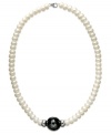 A single strand of polish and shine. This pretty necklace features cultured freshwater pearls (8-8-1/2 mm) and bold onyx beads (12 ct. t.w.). Set in sterling silver. Approximate length: 18 inches.