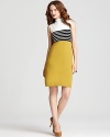 Bold color and graphic stripes meet for a standout look on this Milly dress--complete with a unique funnel neckline--creating a sophisticated silhouette to update your workweek repertoire.