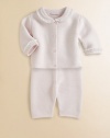 Baby will be cuddle-ready in this precious knit cotton set with smocked trim and matching pants.Round collarLong sleevesFront buttonsElastic waistCottonMachine washImported Please note: Number of buttons may vary depending on size ordered. 