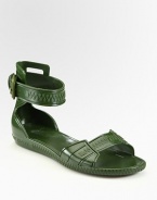 Casual-cool rubber style with an adjustable, wrap-around ankle strap. Rubber upperRubber solePadded insoleMade in ItalyOUR FIT MODEL RECOMMENDS ordering true whole size; ½ sizes should order the next whole size down 