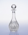 Dramatic cuts and a modern shape give this wine decanter a stunning flair. Topped by a beautiful crystal orb this decanter displays your fine wine in an equally fine setting. A wonderful gift for any oenophile.