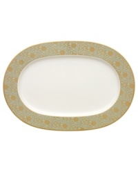 Perfect for casual dining or formal entertaining, this collection features a blend of gilded opulence and sophisticated style. Cheerful flower blossoms float gracefully across white bone china and gold and aqua filigree patterns as this lively set enhances your tabletop.