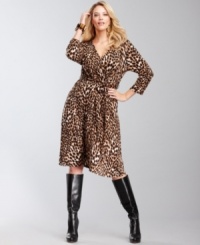 So fabulous, it's begging to be bought! INC's plus size wrap dress features a bold animal print and styling that works for day or night!