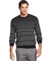 Magnify your on-point style with this standout striped sweater from Geoffrey Beene.