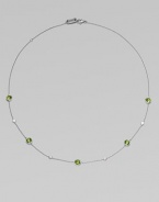 From the Silver Rain Collection. Delicate diamonds and faceted peridot are equally radiant within settings of hammered sterling silver on a graceful chain.Diamonds, .20 tcw Peridot Sterling silver Length, about 18 Lobster clasp Imported