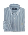 A trim-fitting long-sleeved shirt is crafted from silky cotton poplin in a bold striped pattern.