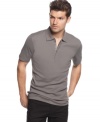 This quarter-zip polo shirt from Hugo Boss Black is a modern upgrade on your traditionally cool look.