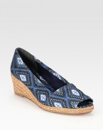 Braided leather wedge and platform defined by a soft, tribal-print linen upper. Braided leather wedge, 2 (50mm)Braided leather platform, ½ (15mm)Compares to a 1½ heel (40mm)Printed linen upperLinen liningLeather solePadded insoleImportedOUR FIT MODEL RECOMMENDS ordering true size. 