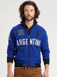 Sport your support of Argentina in a full-zip pieced fleece jacket with bold color-blocking, a snow polo crest and Ralph Lauren's embroidered Big Pony for a signature finish.Zip frontStand collarSide zip pocketsBanded cuffs and hem67% cotton/33% polyesterMachine washImported