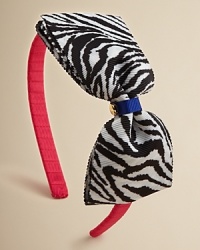 This wildly cute hair accessory features a ziger bow with a heart charm and a hot pink headband.