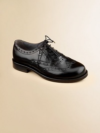 Constructed in the softest leather, this classic oxford is designed in a lace-up silhouette with intricate cut-out details.Lace-upLeather upperLeather liningRubber solePadded insoleImported